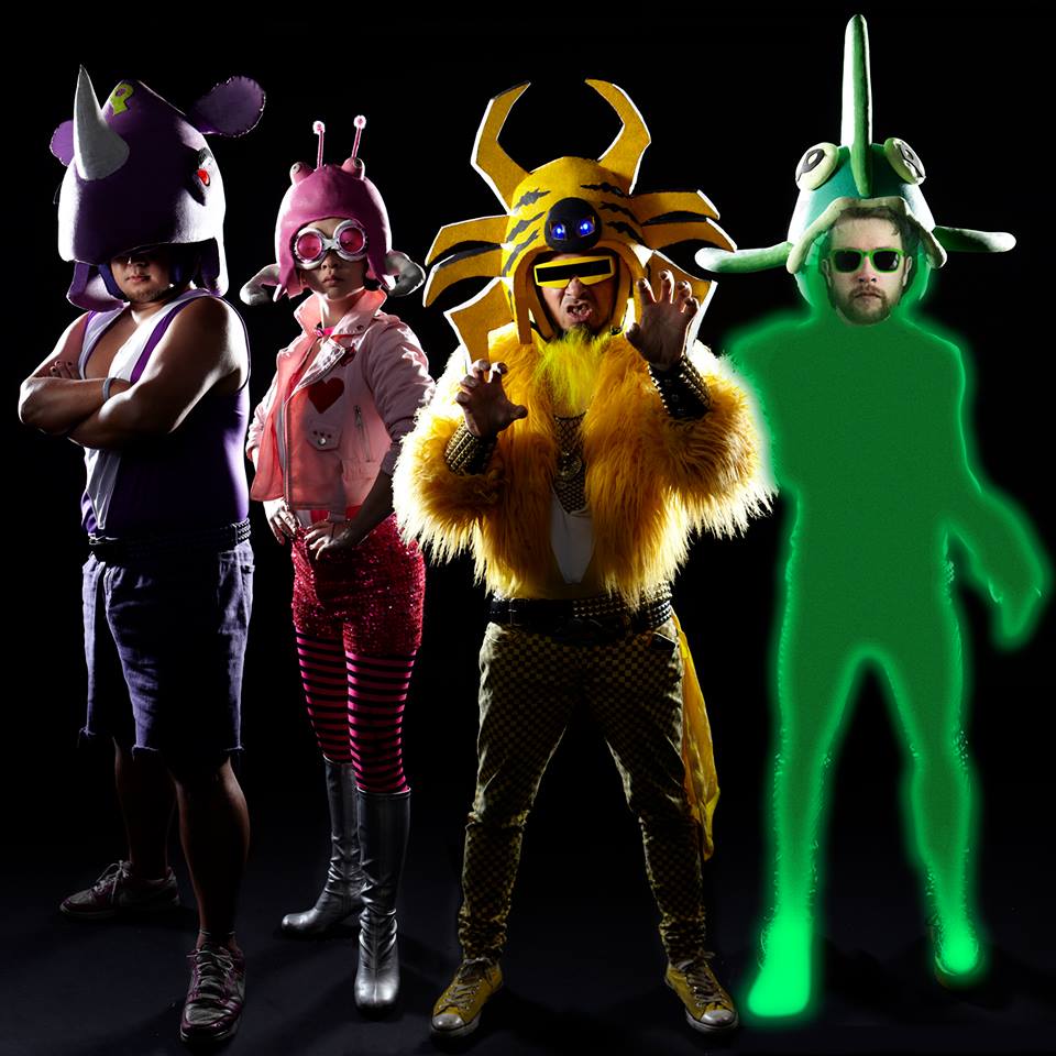 The color-coded members of Peelander-Z with newcomer Chris Heaton as the new Peelander Green.