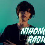 Japanese musician Kenshi Yonezu serves as the cover art for this episode. He's pretty much the biggest name in Japanese music at the moment.